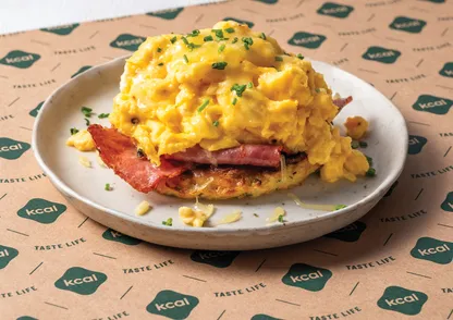 Scrambled Eggs on Hashbrowns and Turkey Bacon